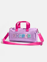 BaubleBar Thready to Go Kids' Custom Duffle - Lilac/Blue Multi - 
    Children's day bag
  
