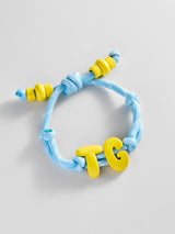 BaubleBar Knotty Enamel Initial Custom Bracelet - Blue/Yellow Double Letter - 
    Personalized letter bracelet

  
