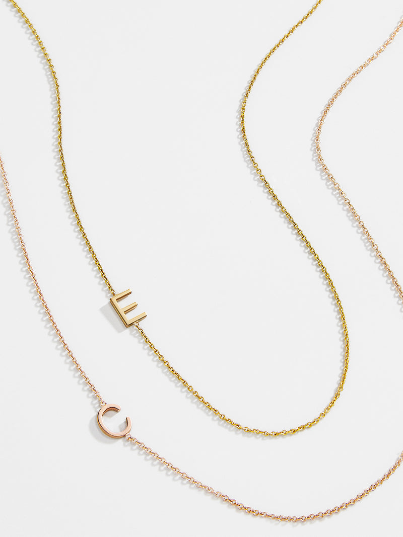 BaubleBar Maya Brenner Asymmetrical Custom Initial Necklace - Single Letter - 
    Solid White Gold, Rose Gold, or Yellow Gold
  
