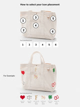 BaubleBar Navy - 
    Hand select 6 icons to personalize your tote
  
