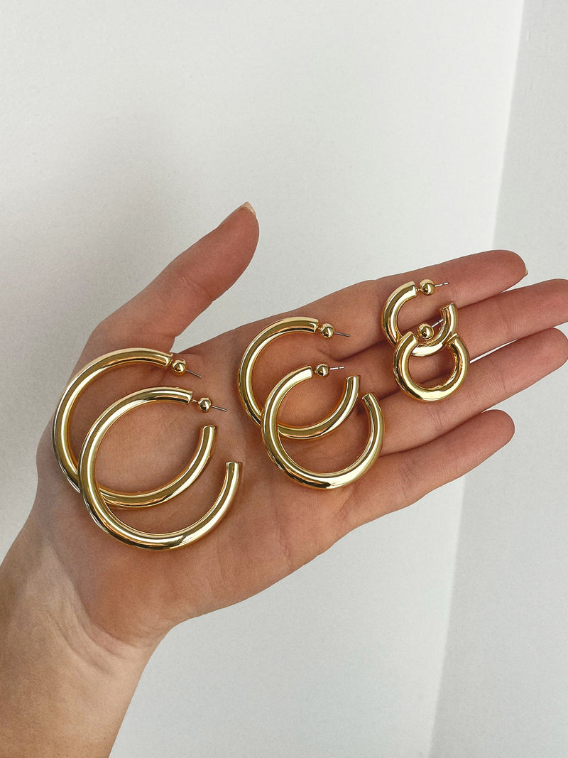 BaubleBar Dalilah Earrings - 46MM - 
    Thin gold hoops
  
