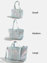 BaubleBar Cherry Red - 
    Personalized canvas tote bag with custom embroidered initials 
  
