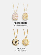 BaubleBar 18K Gold Medallion Necklace - Evil Eye Medallion - 
    Reversible, 18K Gold Plated Sterling Silver
  
