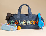 BaubleBar  - 
    Personalized travel bag 
  
