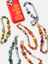 BaubleBar  - 
    Hands-free wristlet phone strap 
  
