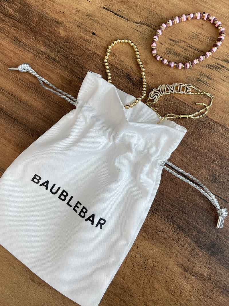 BaubleBar Medium White Pouch - White - 
    White gift pouch
  
