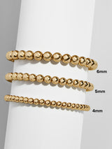 BaubleBar Pisa Bracelet - Gold Plated - 
    Gold beaded stretch bracelet - Also offered in small wrist sizes
  
