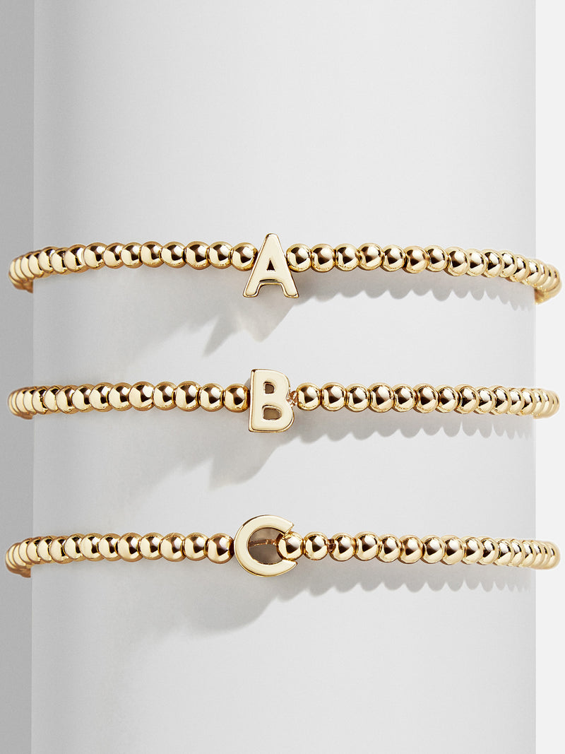 BaubleBar Initial Pisa Bracelet - Gold - 
    Initial beaded bracelet
  
