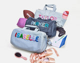 BaubleBar  - 
    Personalized travel bag 
  
