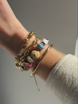BaubleBar Friends Forever Charm Bracelet - Peanuts - 
    Multicolored pull-tie bracelet
  
