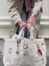 BaubleBar Beige - 
    Hand select 5 icons to personalize your tote
  
