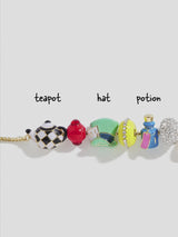 BaubleBar Disney Alice in Wonderland Friends Forever Bracelet - Alice in Wonderland Charm Bracelet - 
    Multicolored pull-tie bracelet
  
