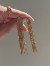 BaubleBar Elektra Fringe Earrings - Gold - 
    Gold statement earrings 
  
