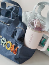 BaubleBar  - 
    Personalized travel bag 
  
