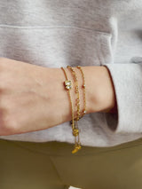 BaubleBar Cosette Waterproof Bracelet Set - Cosette Waterproof Bracelet Set - 
    Set of three gold bracelets 
  
