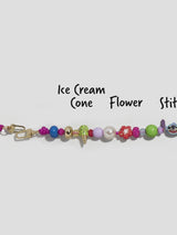 BaubleBar Disney Lilo & Stitch Phone Charm - Disney Lilo & Stitch Phone Charm - 
    Beaded phone charm 
  
