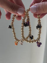 BaubleBar Disney Mickey Mouse Halloween Charm Bracelet - All Hallows' Hue - 
    Beaded bracelet with Halloween charms 
  

