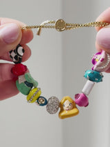 BaubleBar Disney Alice in Wonderland Friends Forever Bracelet - Alice in Wonderland Charm Bracelet - 
    Multicolored pull-tie bracelet
  
