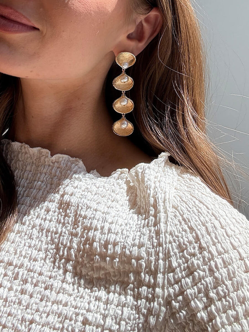 BaubleBar Calypso Seashell Earrings - Gold/Pearl - 
    Gold statement earrings with pearls
  
