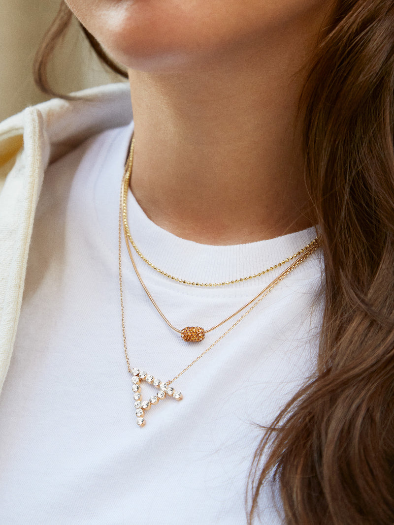 BaubleBar Asymmetrical Large Initial Necklace - Gold/Clear - Oversized crystal letter pendant necklace