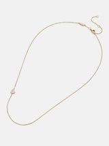 BaubleBar 18K Gold Asymmetrical Heart Necklace - Pavé Heart - 
    18K Gold Plated Sterling Silver, Cubic Zirconia stones
  
