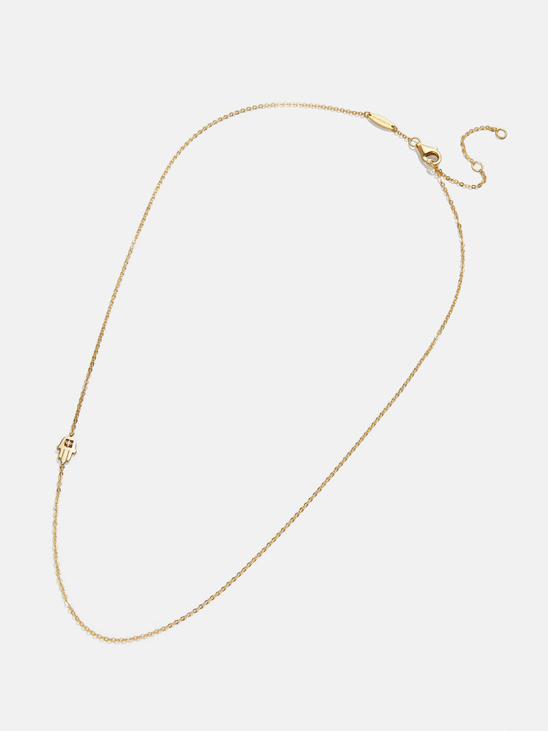 BaubleBar 18K Gold Asymmetrical Hamsa Necklace - Gold Hamsa - 
    18K Gold Plated Sterling Silver, Cubic Zirconia stone
  
