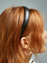 BaubleBar Morgan Headband - Black - 
    Black faux leather headband
  
