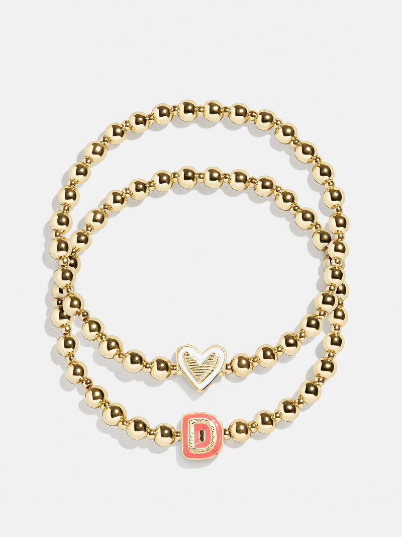 BaubleBar D - 
    Two kids' gold beaded stretch bracelets
  
