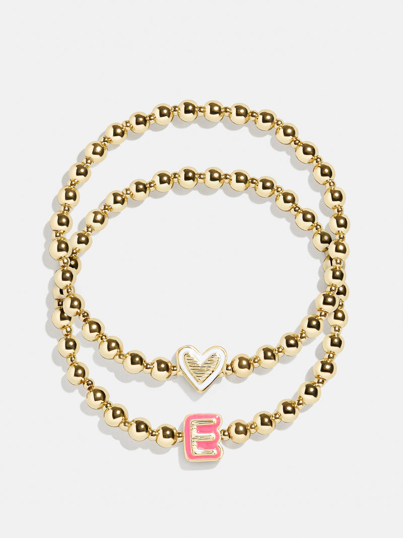 BaubleBar E - 
    Two kids' gold beaded stretch bracelets
  
