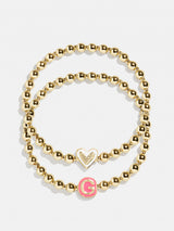 BaubleBar Initial & Heart Kids' Pisa Bracelet Set - Gold - 
    Set of two stretch bracelets
  

