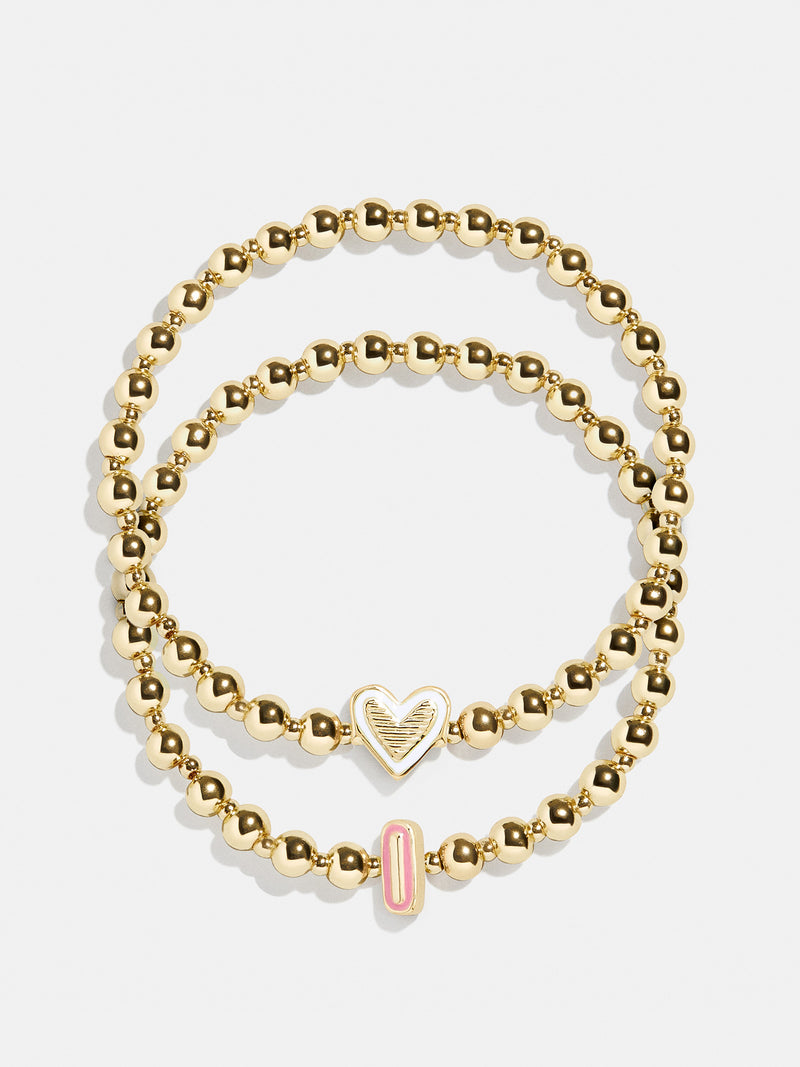 BaubleBar I - 
    Two kids' gold beaded stretch bracelets
  
