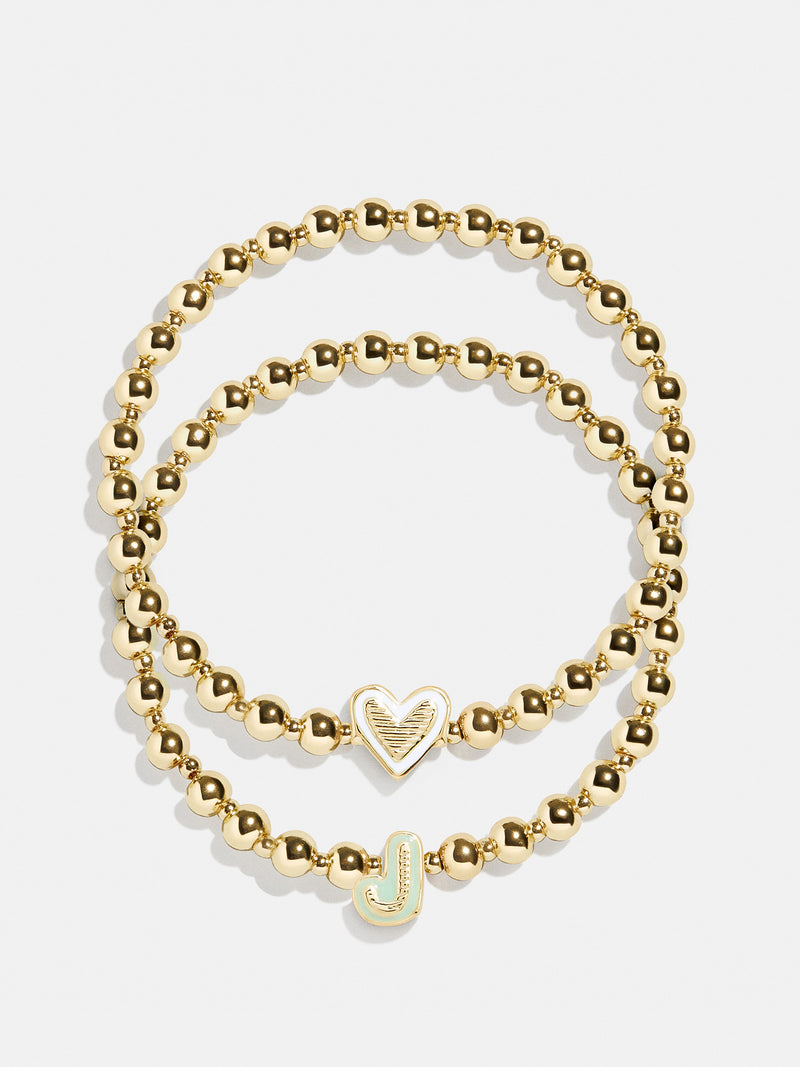 BaubleBar J - 
    Two kids' gold beaded stretch bracelets
  
