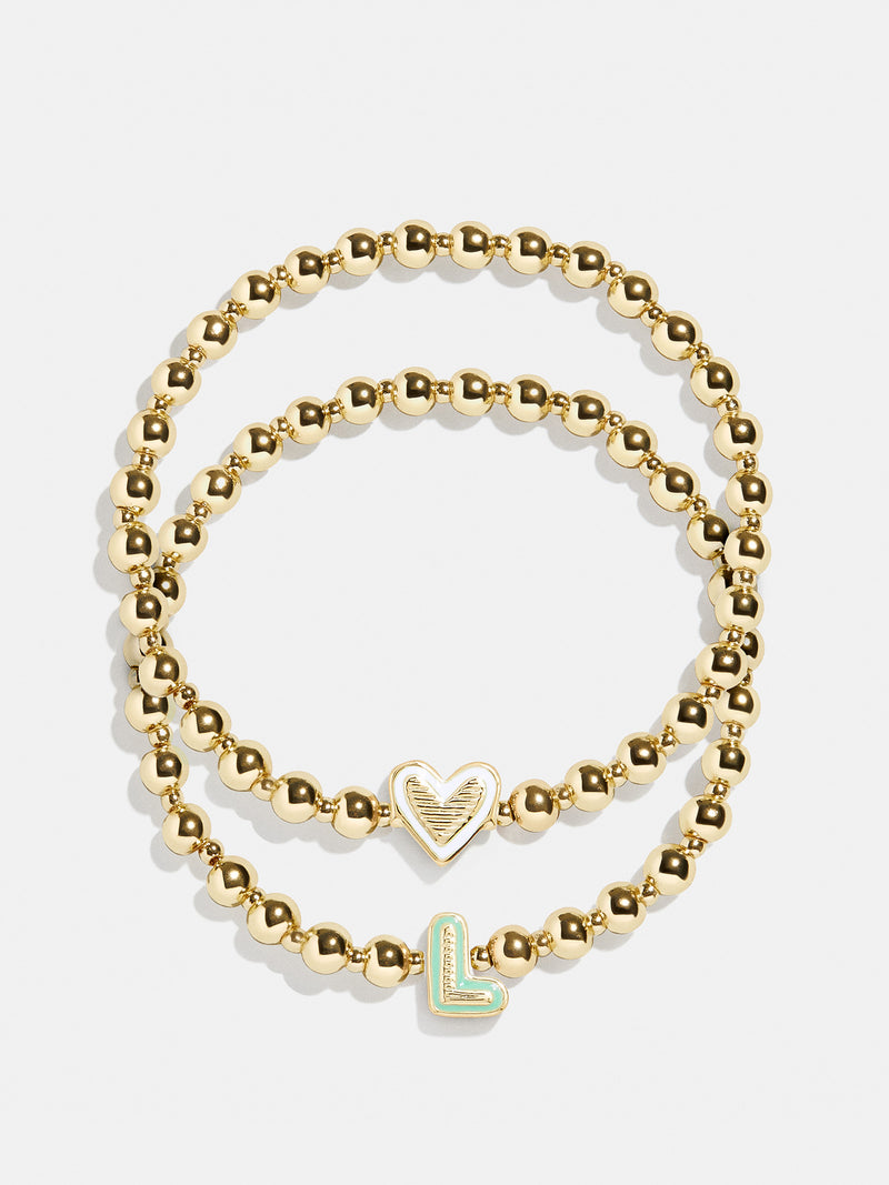 BaubleBar L - 
    Two kids' gold beaded stretch bracelets
  
