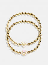 BaubleBar O - 
    Two kids' gold beaded stretch bracelets
  
