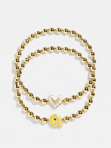 BaubleBar Q - 
    Two kids' gold beaded stretch bracelets
  
