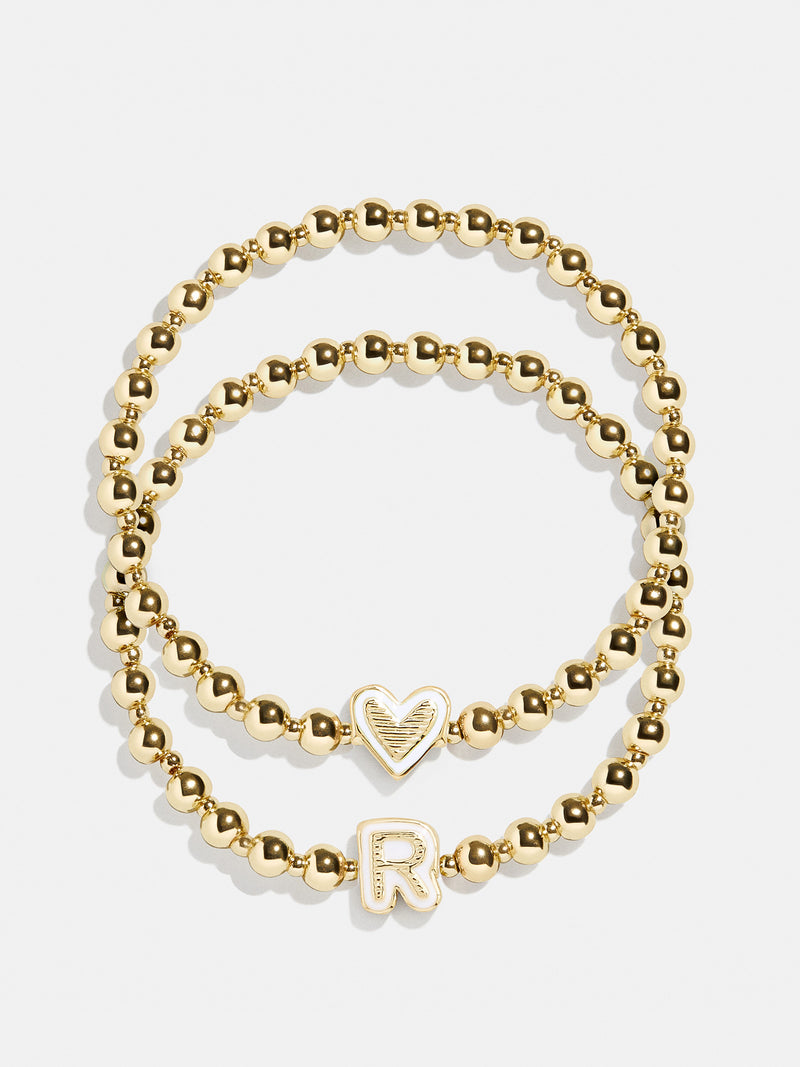 BaubleBar R - 
    Two kids' gold beaded stretch bracelets
  

