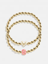 BaubleBar S - 
    Two kids' gold beaded stretch bracelets
  
