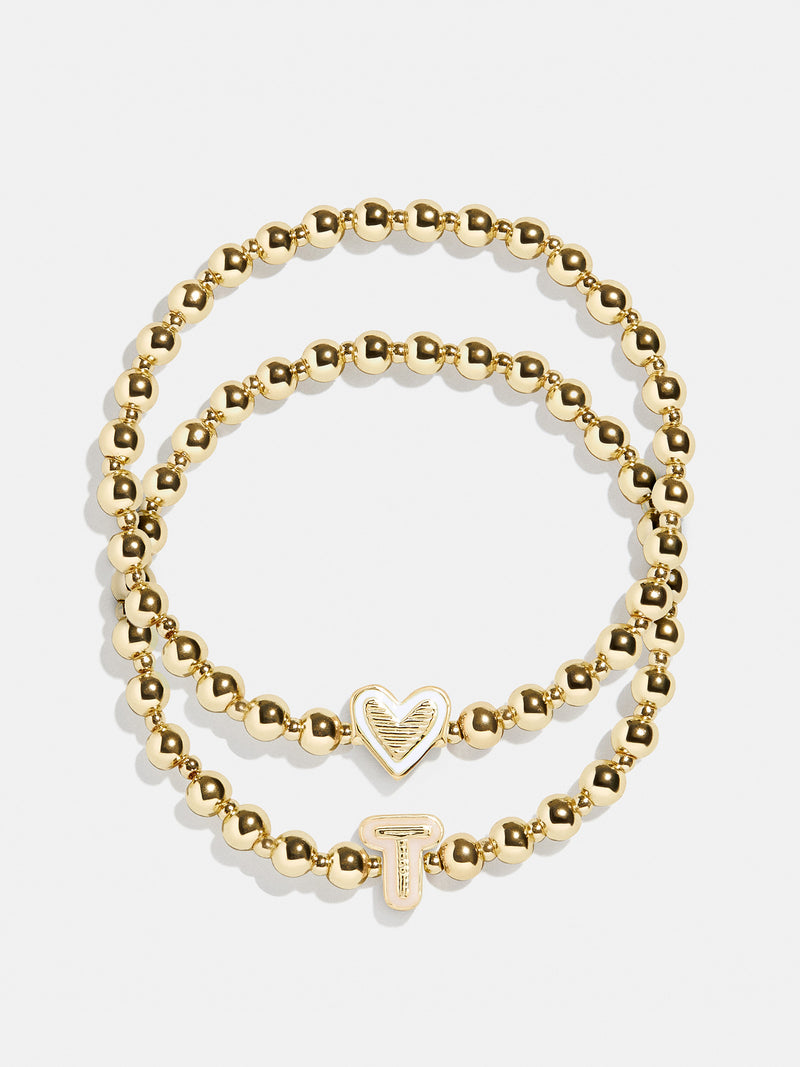 BaubleBar T - 
    Two kids' gold beaded stretch bracelets
  
