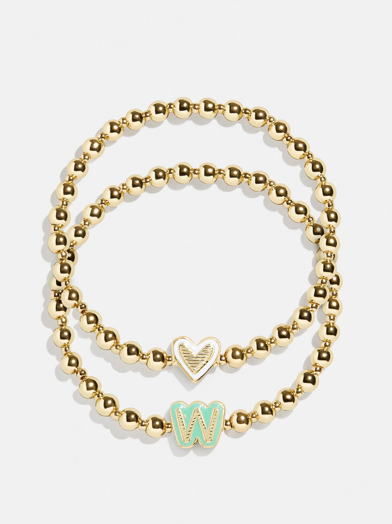 BaubleBar W - 
    Two kids' gold beaded stretch bracelets
  
