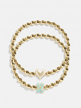 BaubleBar X - 
    Two kids' gold beaded stretch bracelets
  
