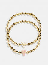 BaubleBar Y - 
    Two kids' gold beaded stretch bracelets
  
