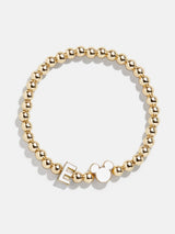 BaubleBar E - 
    Disney gold beaded stretch bracelet
  
