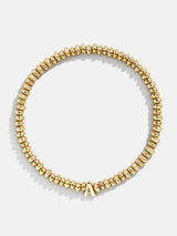 BaubleBar A - Gold beaded stretch bracelet