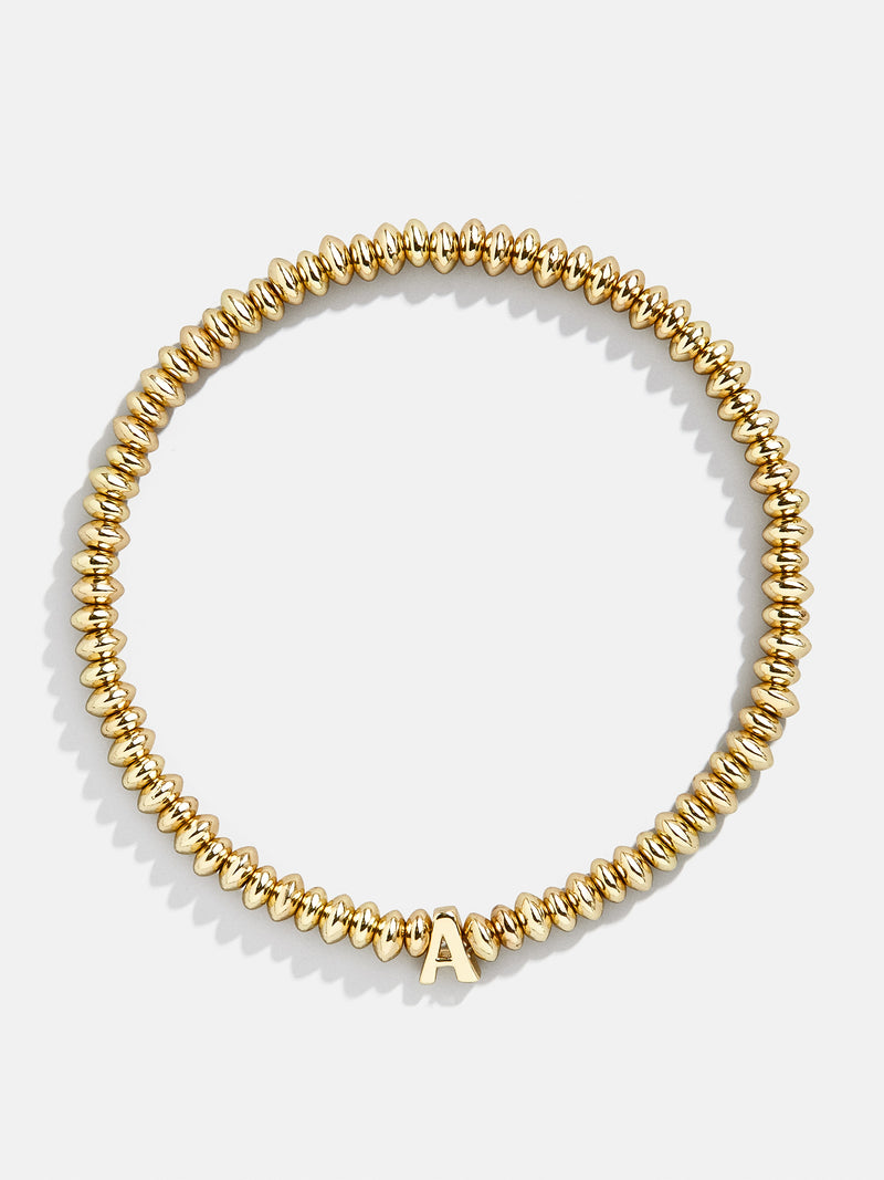 BaubleBar A - 
    Gold beaded stretch bracelet
  
