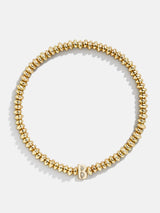 BaubleBar B - Gold beaded stretch bracelet