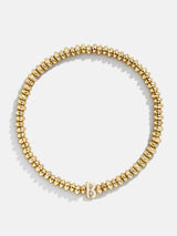 BaubleBar B - 
    Gold beaded stretch bracelet
  
