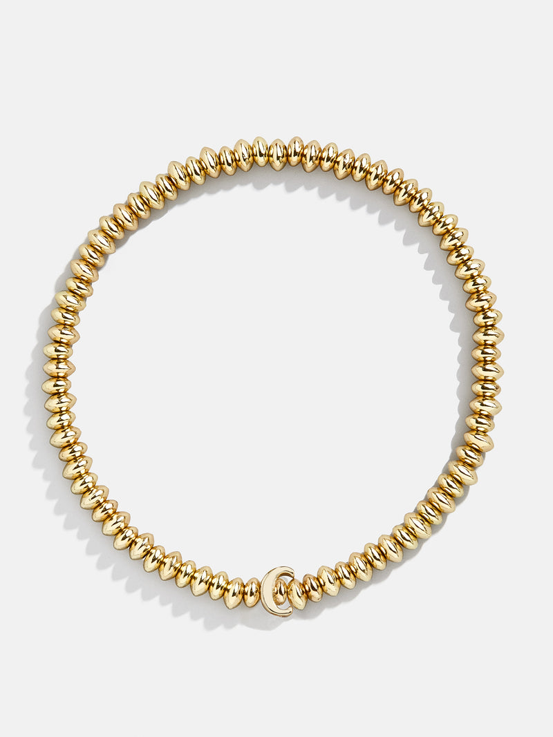BaubleBar C - Gold beaded stretch bracelet