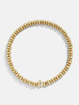 BaubleBar D - Gold beaded stretch bracelet