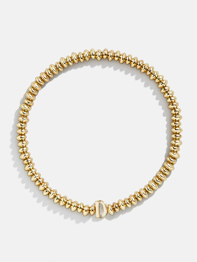 BaubleBar D - Gold beaded stretch bracelet
