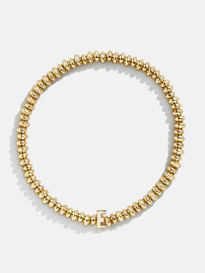BaubleBar E - Gold beaded stretch bracelet